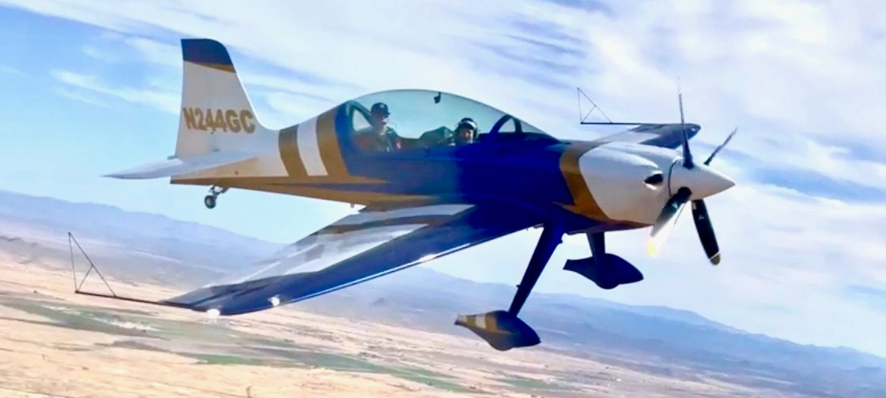 Two people experiencing Arizona from the GameBird cockpit